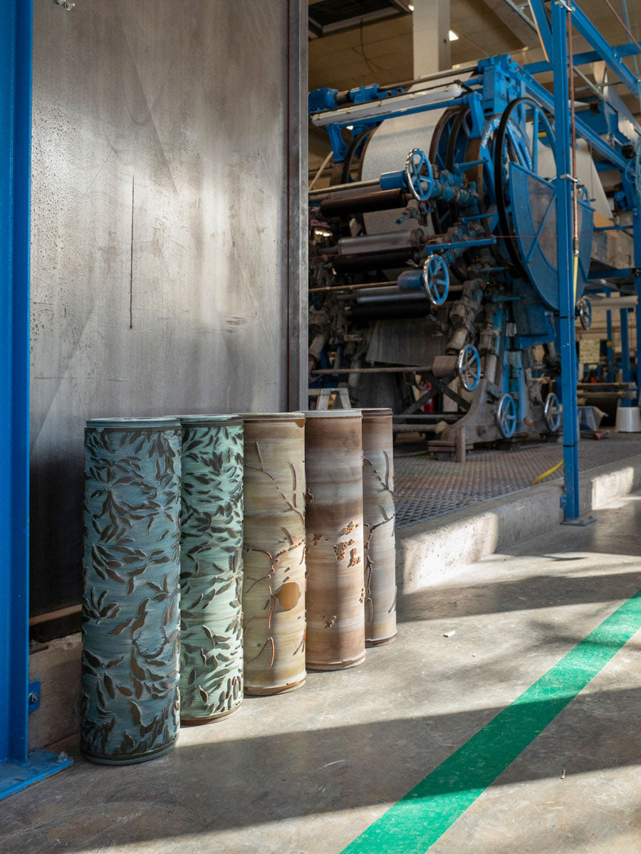 Citrus rolls in front of the surface-print machine at Ulricehamns Tapetfabrik