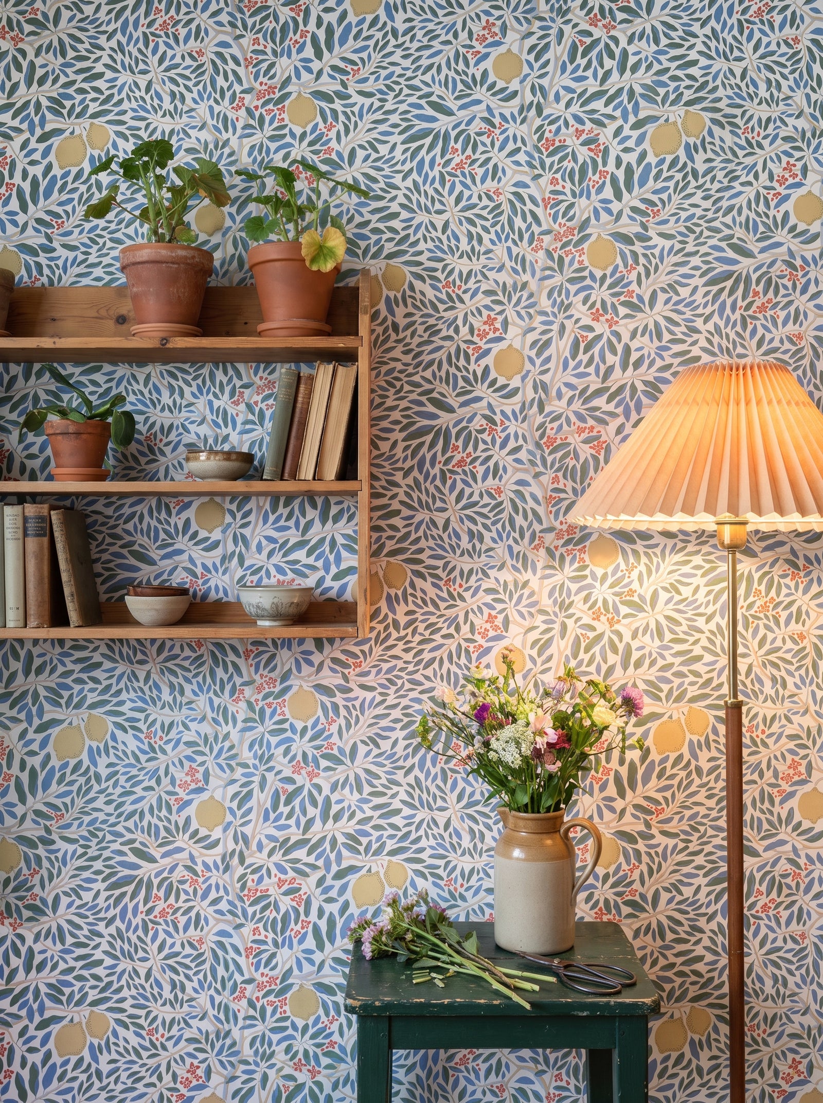 Citrus Vibrant Bloom wallpaper shown on a room wall