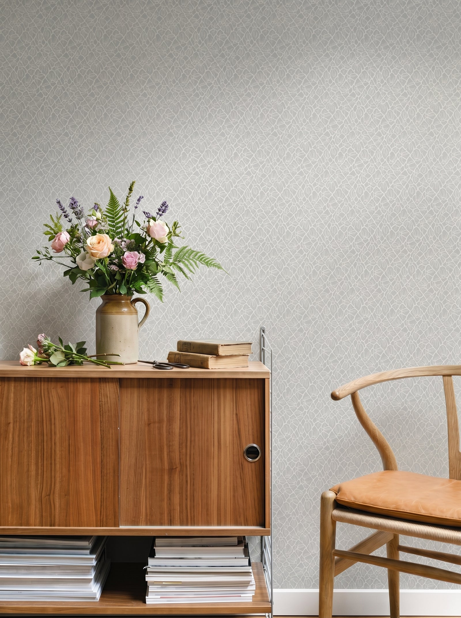 Fröviva Light Blue Ash wallpaper shown on a room wall