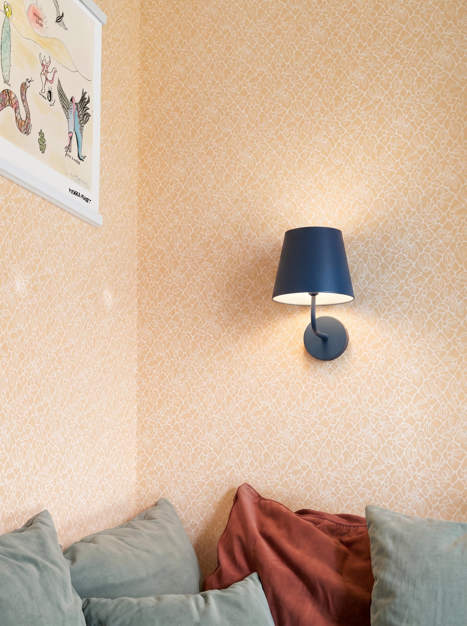 Fröviva Soft Mandarin wallpaper decorating an interior wall