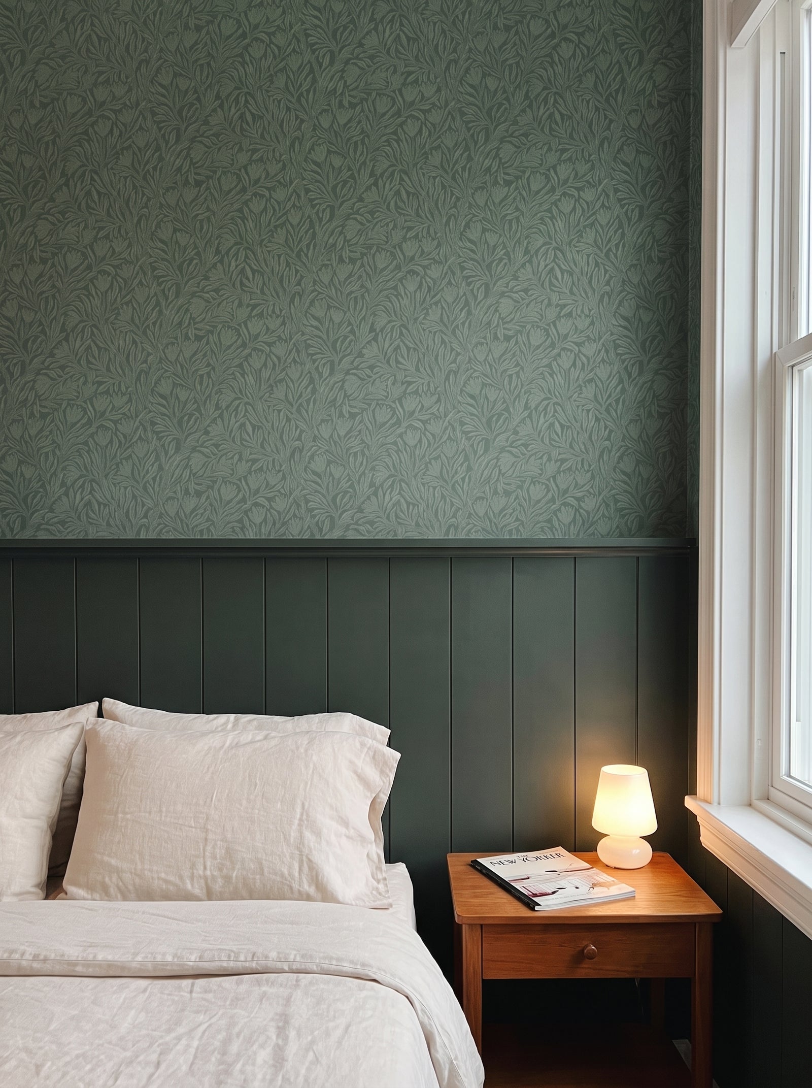 Krokus Forest Green wallpaper in a styled interior
