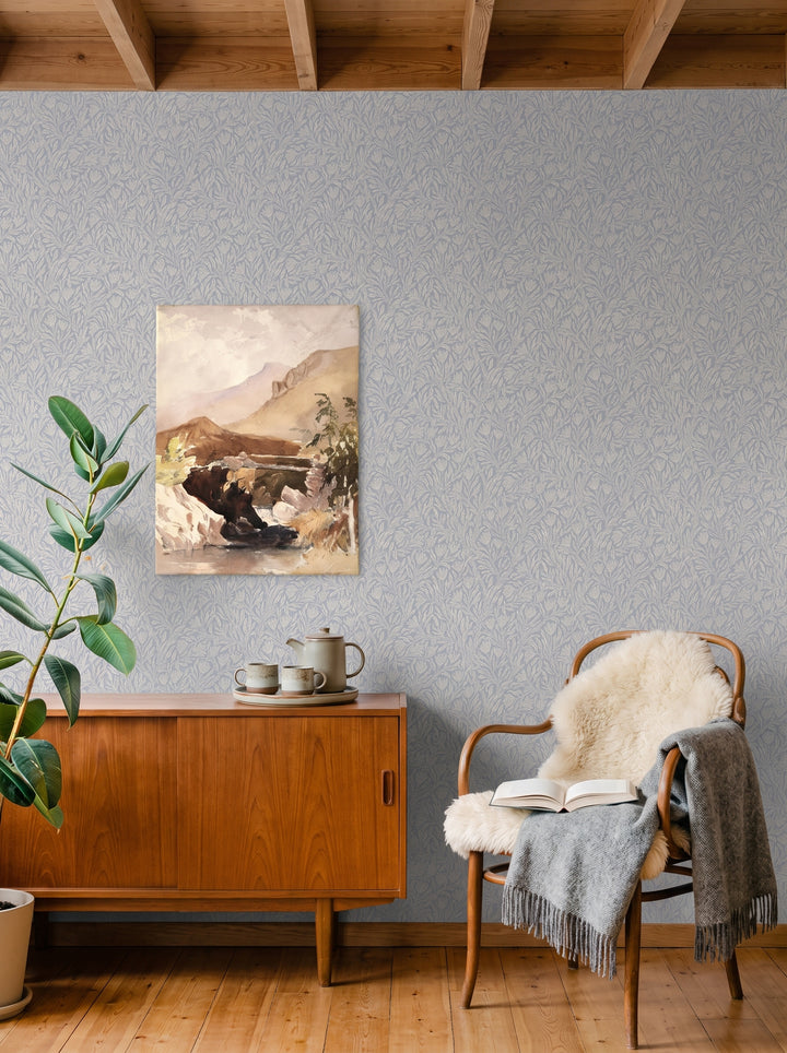 Krokus Smokey Blue wallpaper shown on a room wall