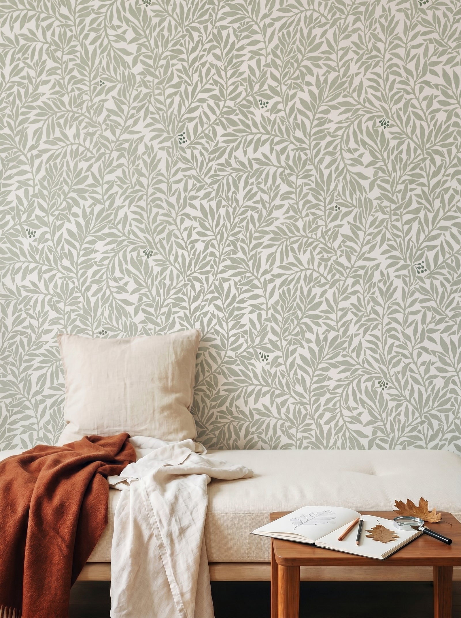 Serpentin Moss Green wallpaper shown on a room wall