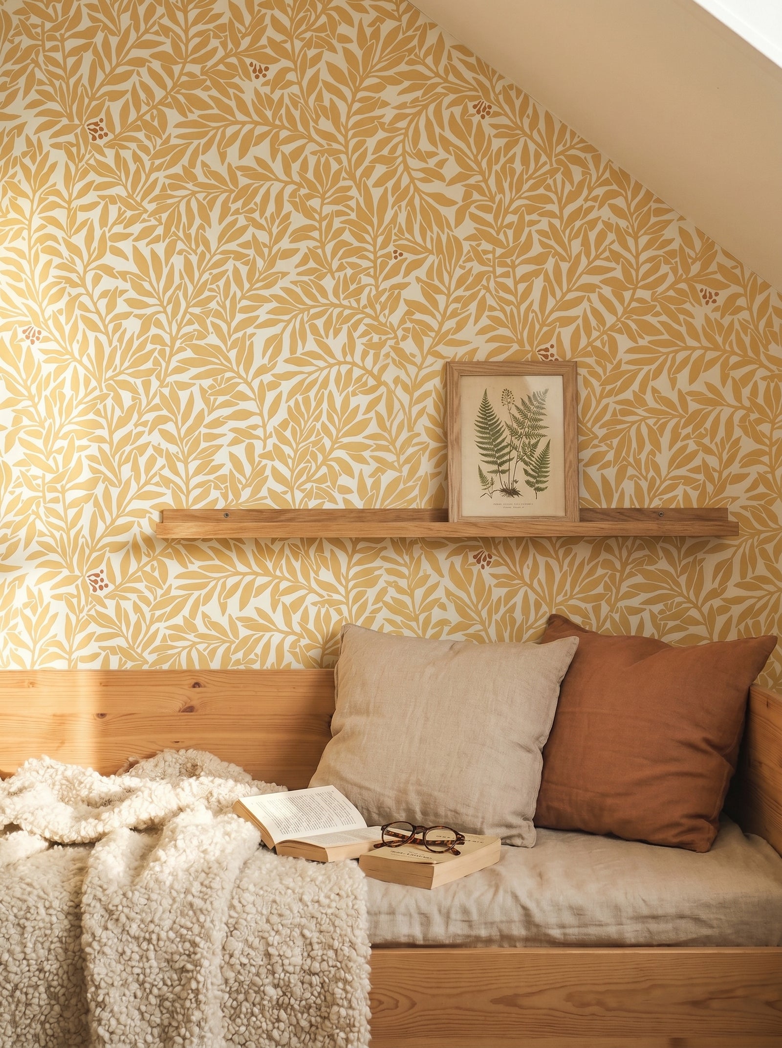 Serpentin Sunny Ochre wallpaper decorating an interior wall