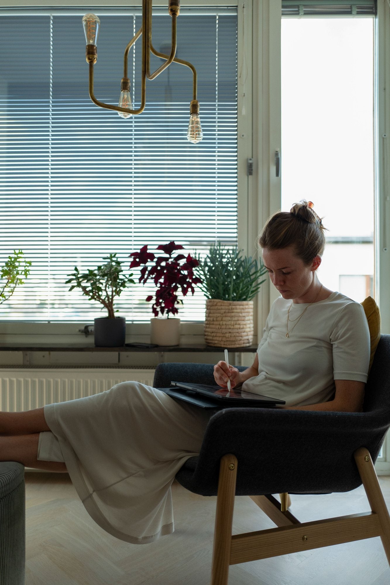 Karolina sketching a new motif at home